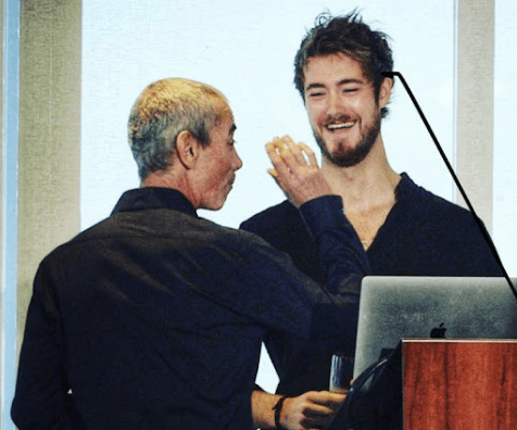 Rían on stage with Steven Kotler
